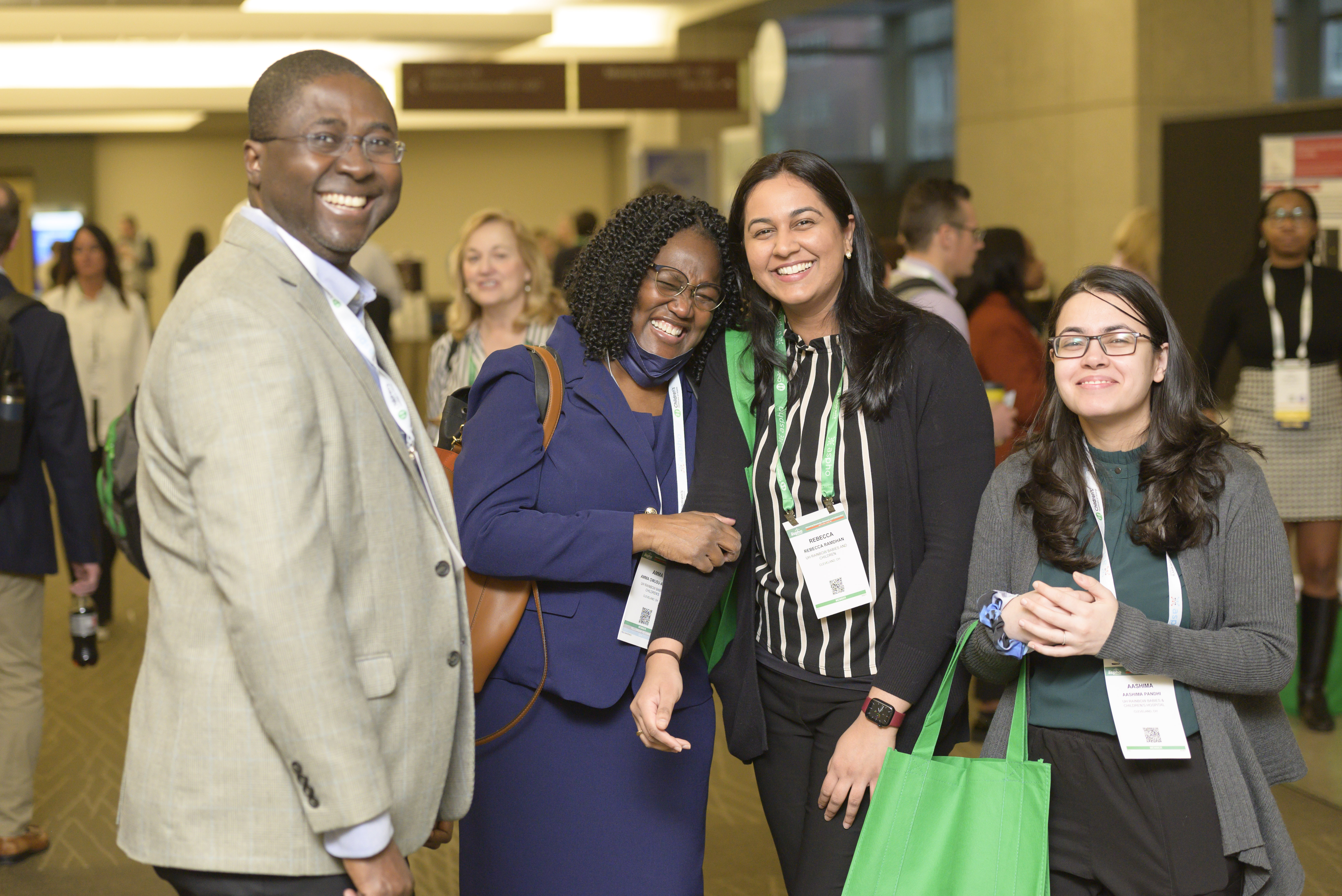 Four Smiling Conference Attendees